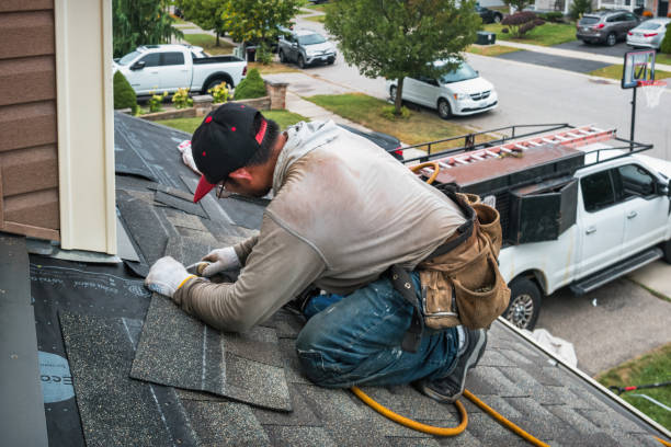 Professional Flat Roof Repair technician working in Greene, ME